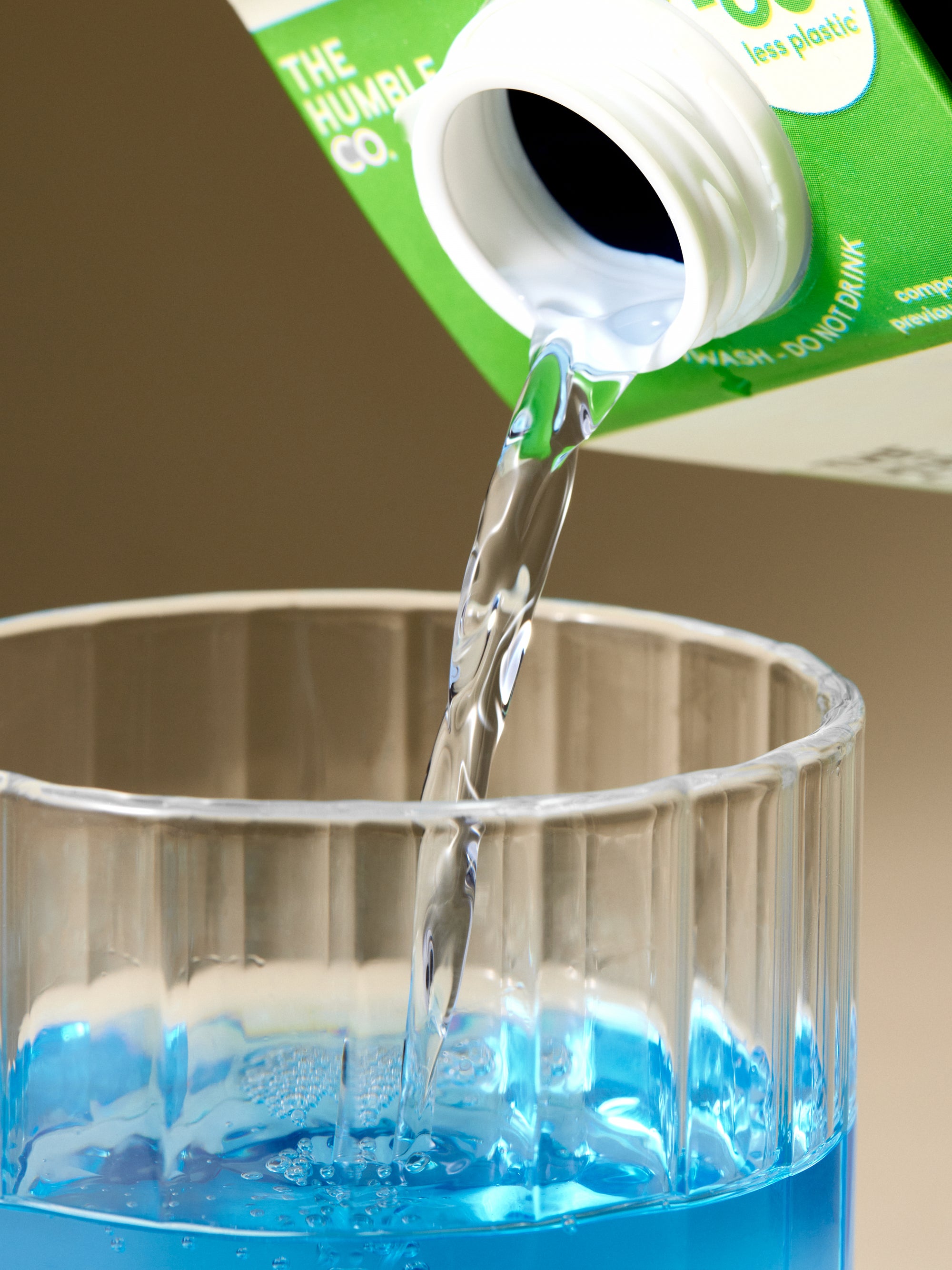 Moutwash pouring in an glas