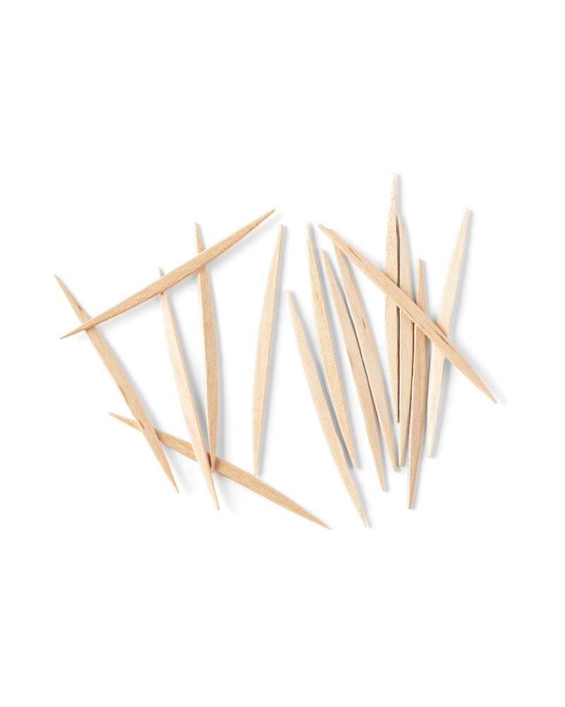 A pile of The Humble Co. bamboo toothpicks, designed with sustainable and eco-friendly materials to promote good oral hygiene.