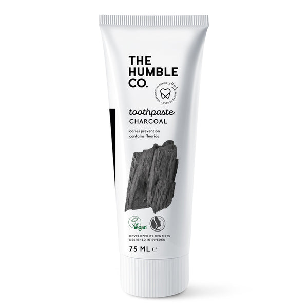 The Humble Co.'s charcoal toothpaste, with a fresh mint flavor, free from SLS and parabens, charcoal infused for natural stain removal and containing 1450ppm sodium fluoride for cavity prevention.