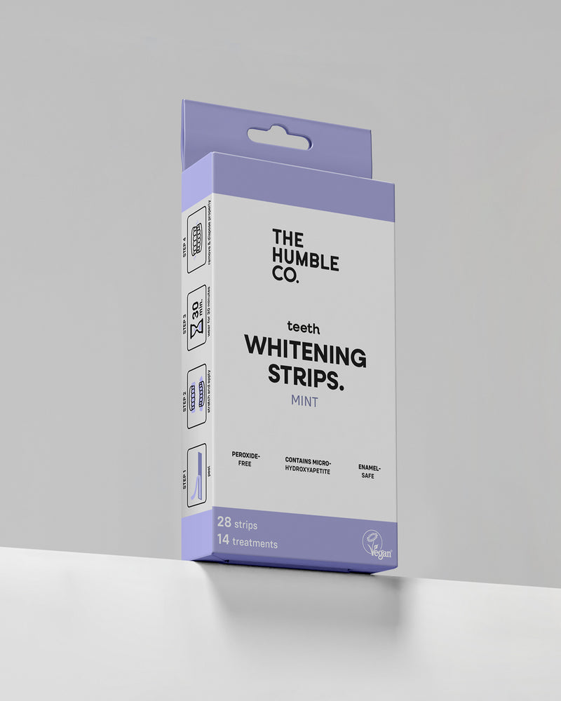 Box of The Humble Co. teeth whitening strips on a light gray background